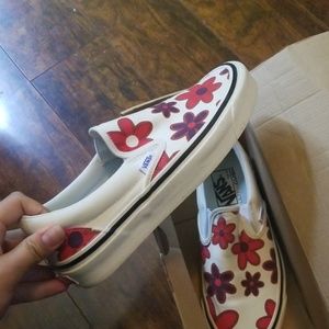 Floral slip-on vans, size 8.5 womens and 7 mens.